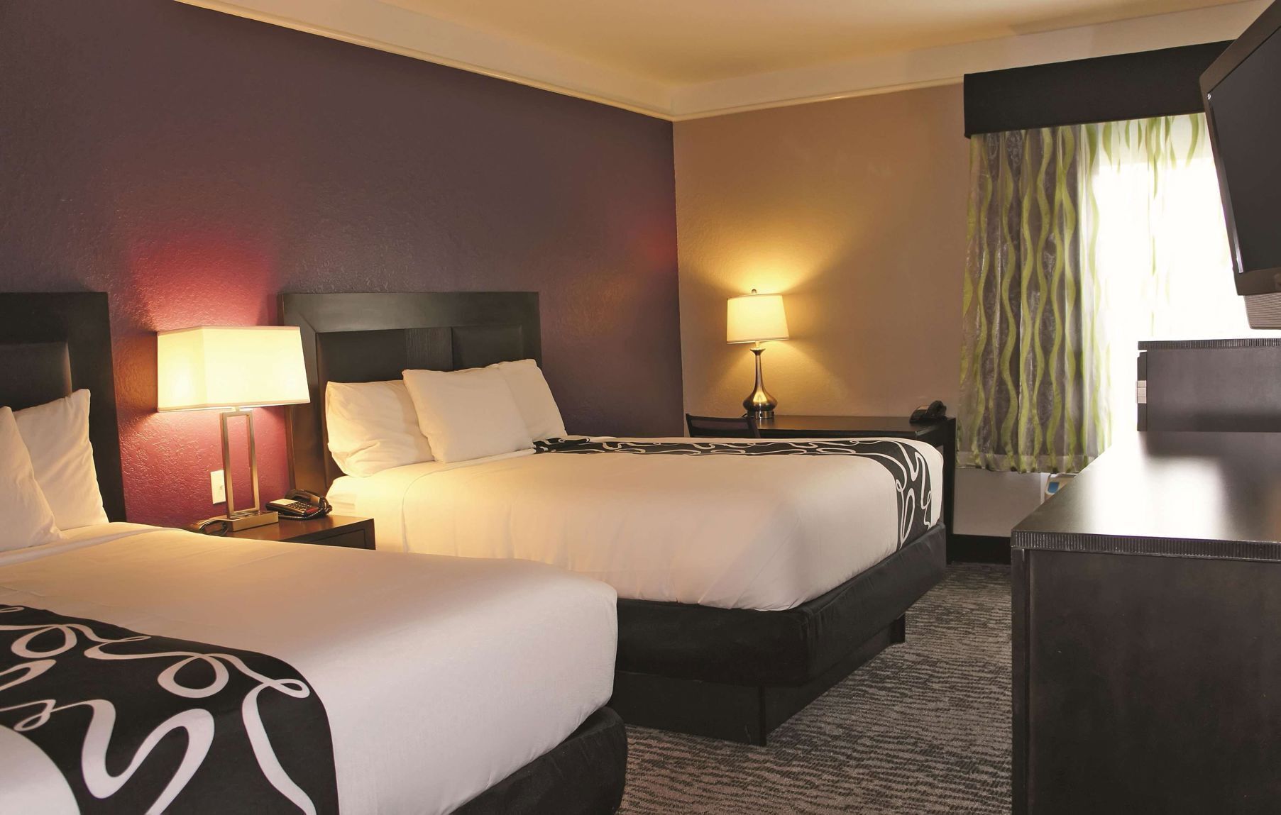 In-room safe, desk, iron/ironing board, free cribs/infant beds