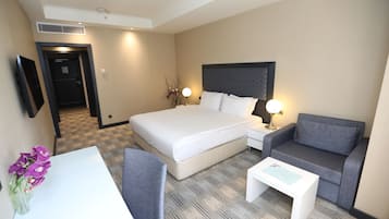 Premium bedding, in-room safe, blackout curtains, soundproofing