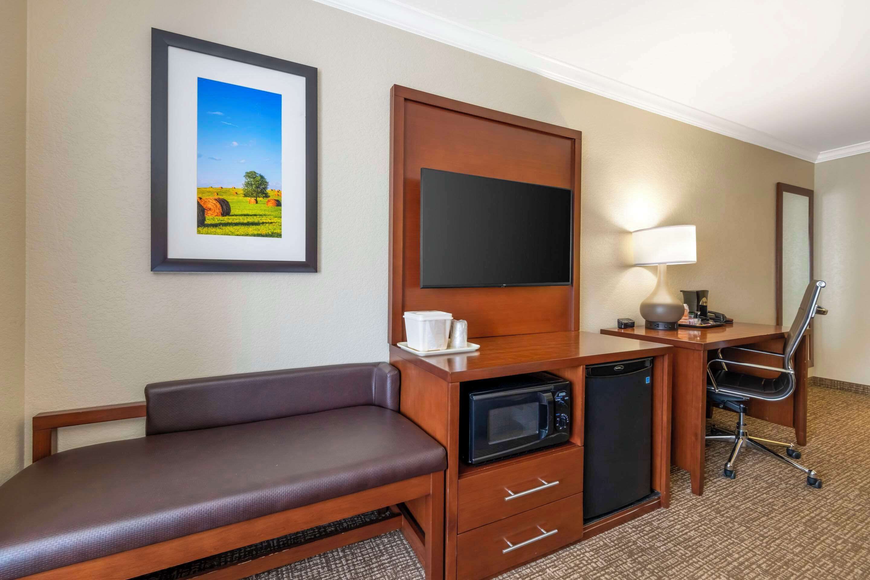 suite, non smoking (2 queen beds with sofa bed) | premium bedding, in-room safe, desk, iron/ironing board