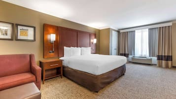 Suite, 1 King Bed with Sofa bed, Non Smoking | Premium bedding, desk, blackout curtains, iron/ironing board