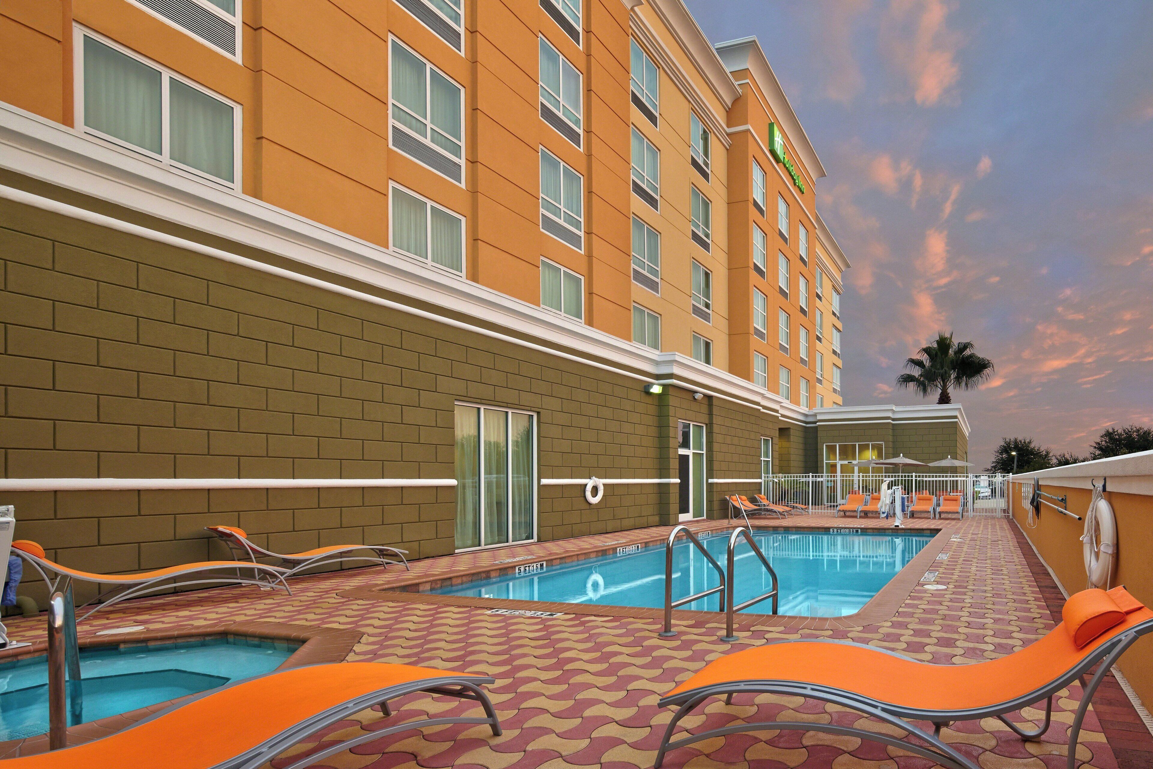 Outdoor pool, open 8:00 AM to 10:00 PM, pool loungers