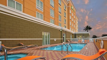 Outdoor pool, open 8:00 AM to 10:00 PM, pool loungers