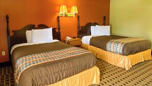 A hotel room with two beds, a nightstand with a phone, and wall-mounted lamps.