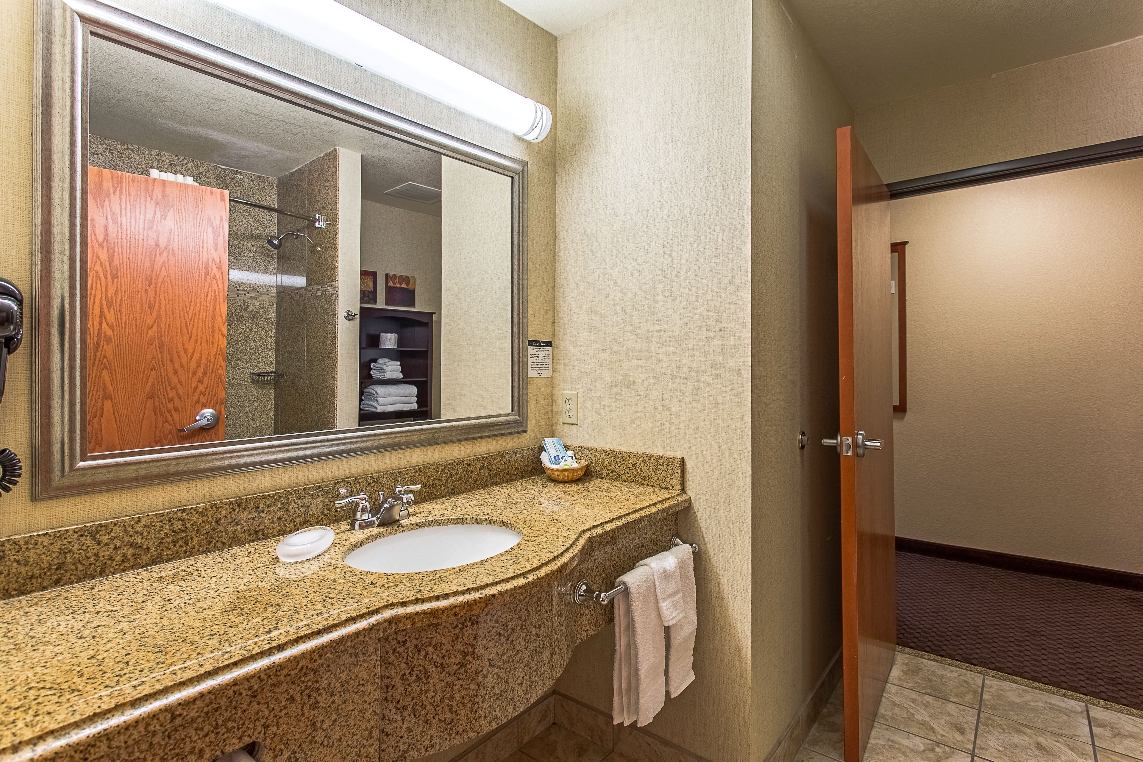 1bedroom suite w/living room w/sofabed | bathroom | combined shower/bathtub, hair dryer, towels