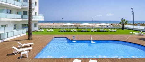 Outdoor pool, pool umbrellas, pool loungers