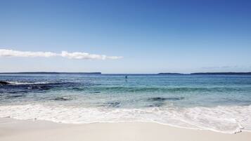 Beach nearby, white sand, beach towels, kayaking