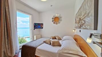 Standaard suite, 2 slaapkamers, gedeeltelijk uitzicht op zee | Uitzicht vanuit de kamer