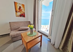 Suite, Balcony, Partial Sea View | Hypo-allergenic bedding, minibar, in-room safe, desk