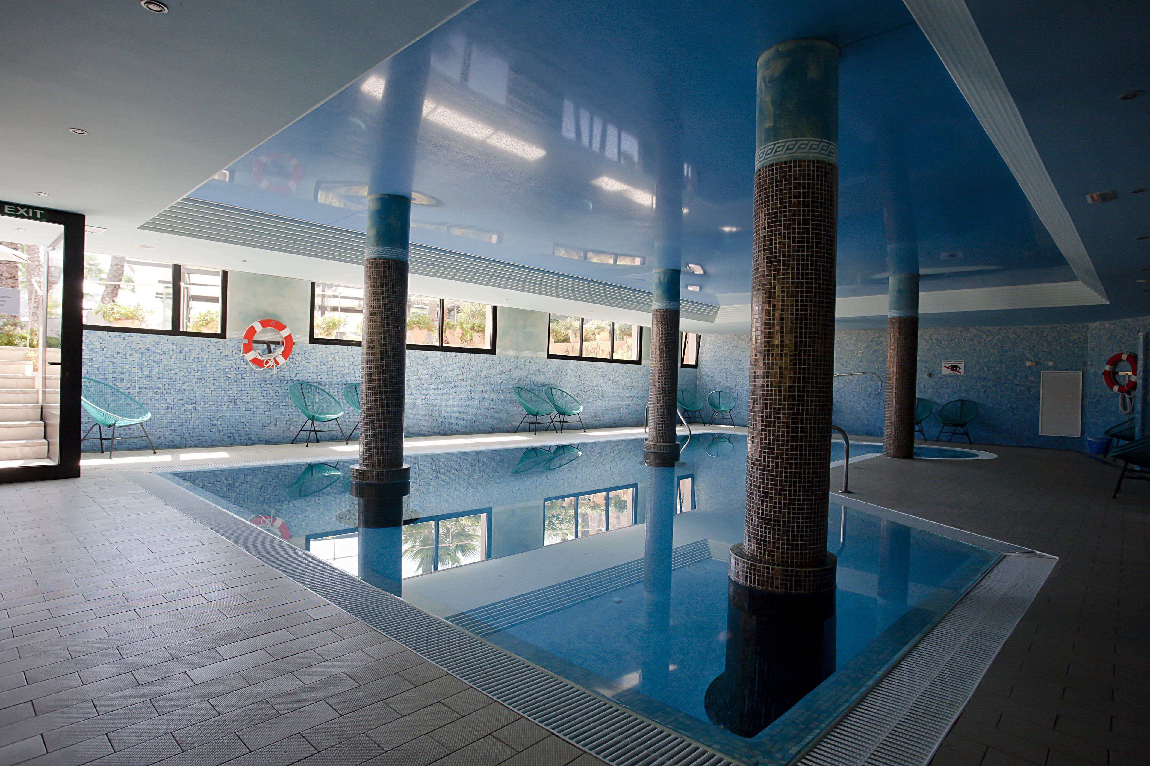 indoor pool, 3 outdoor pools, pool umbrellas, pool loungers