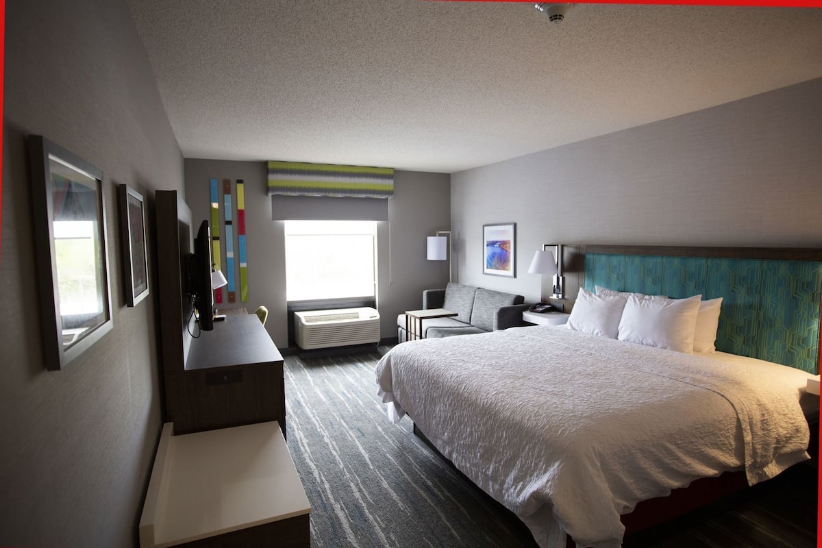 Premium bedding, pillow-top beds, desk, laptop workspace