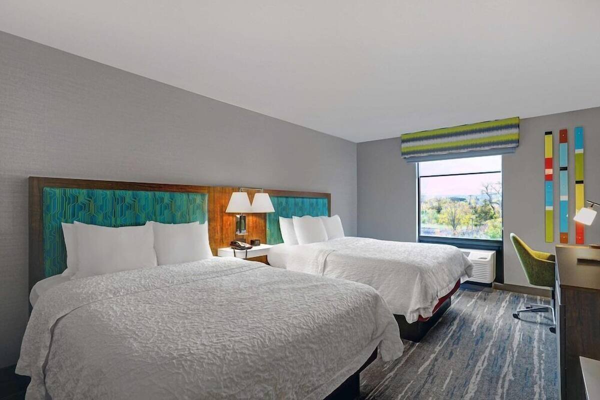Premium bedding, pillowtop beds, desk, laptop workspace