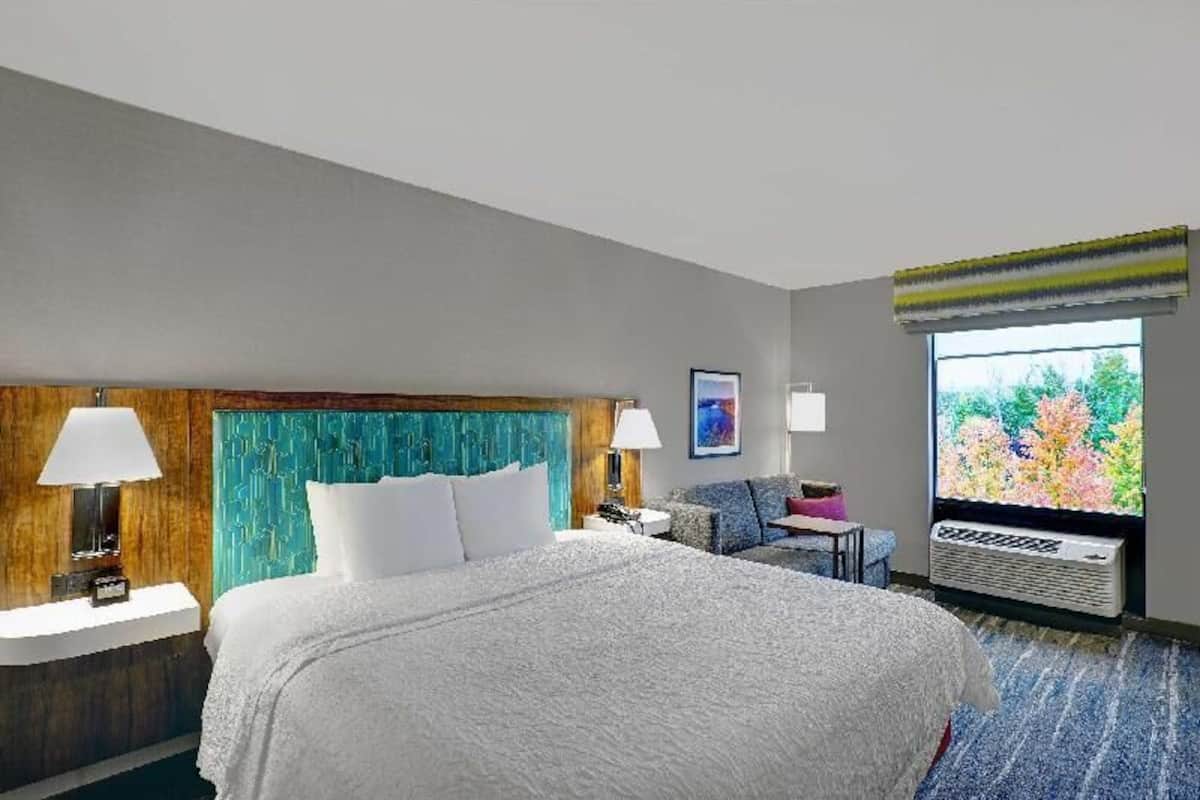 Premium bedding, pillow-top beds, desk, laptop workspace