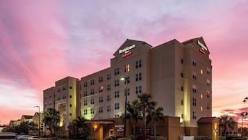 Experience the comfort of Residence Inn's elegant design, featuring a symmetrical facade and beautifully landscaped surroundings.