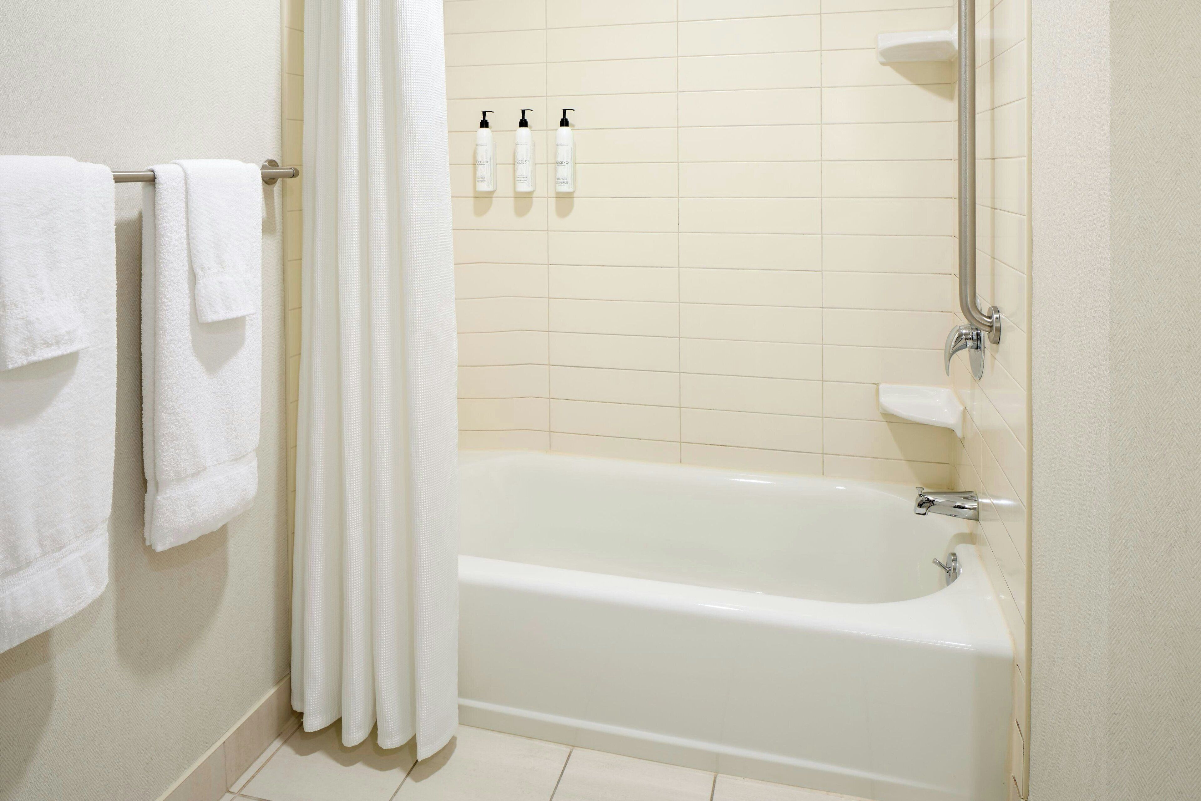 combined shower/bathtub, free toiletries, hair dryer, towels