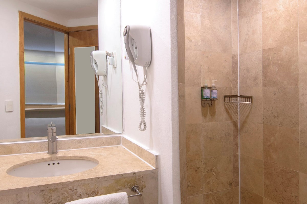 shower, eco-friendly toiletries, hair dryer, towels