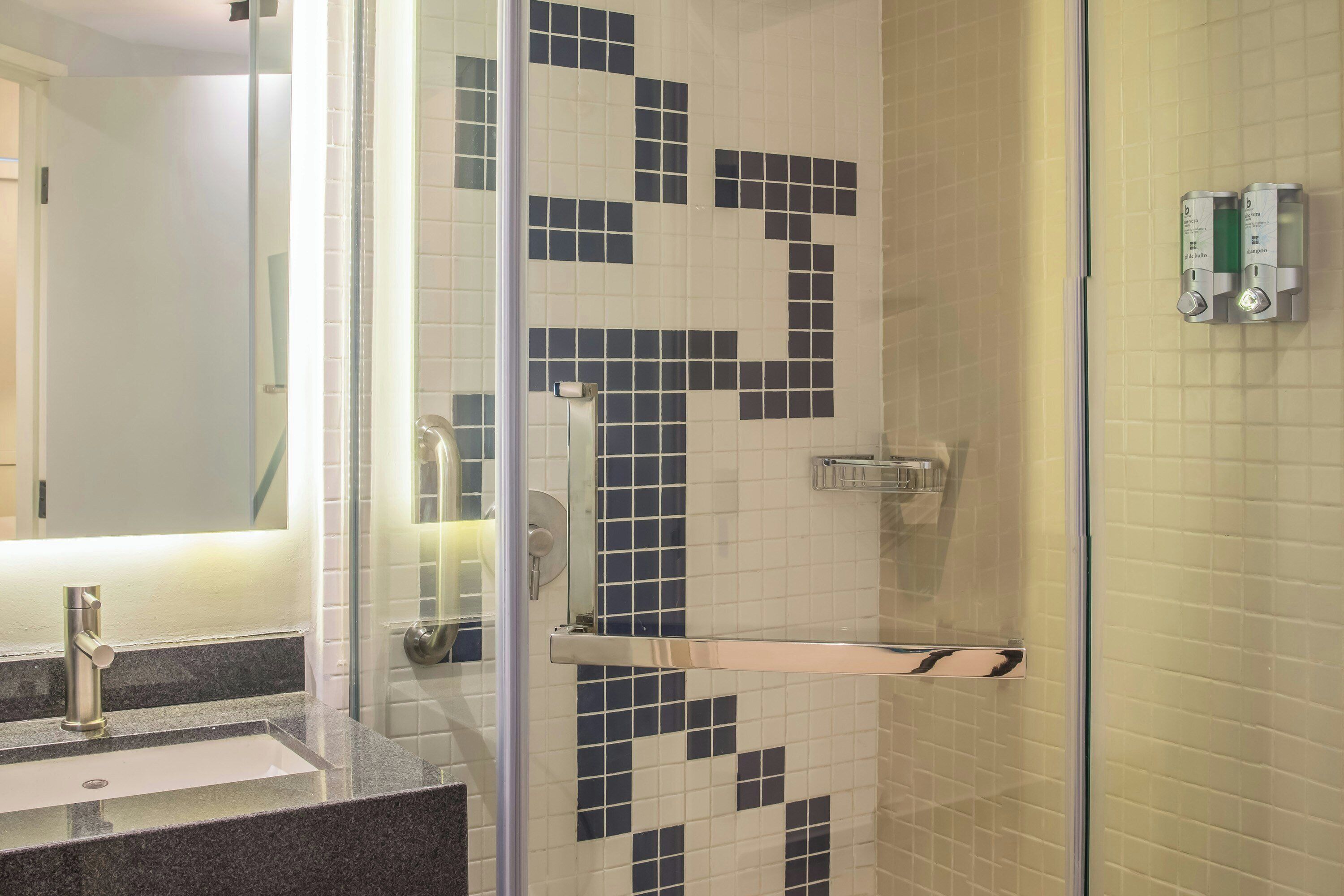 Shower, eco-friendly toiletries, hair dryer, towels