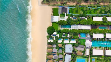 Private beach, free beach cabanas, beach shuttle, sun-loungers