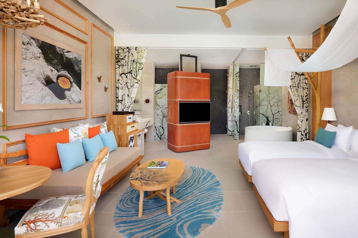 Premium bedding, free minibar items, in-room safe, desk