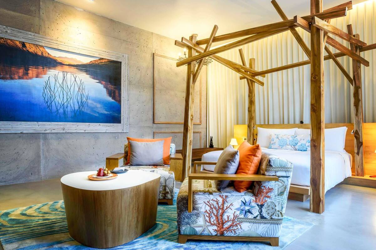 Luxe beddengoed, een minibar met enkele gratis items