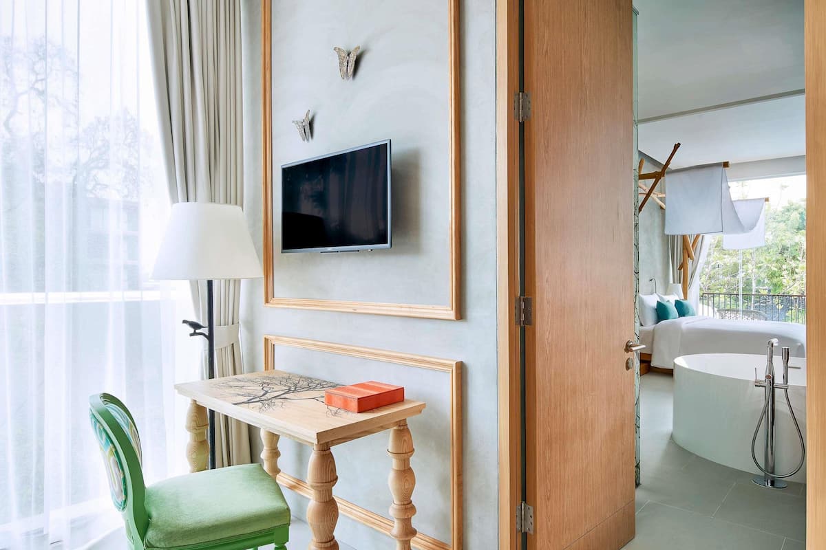 Family Suite, Multiple Beds, Pool View | Premium bedding, free minibar items, in-room safe, desk