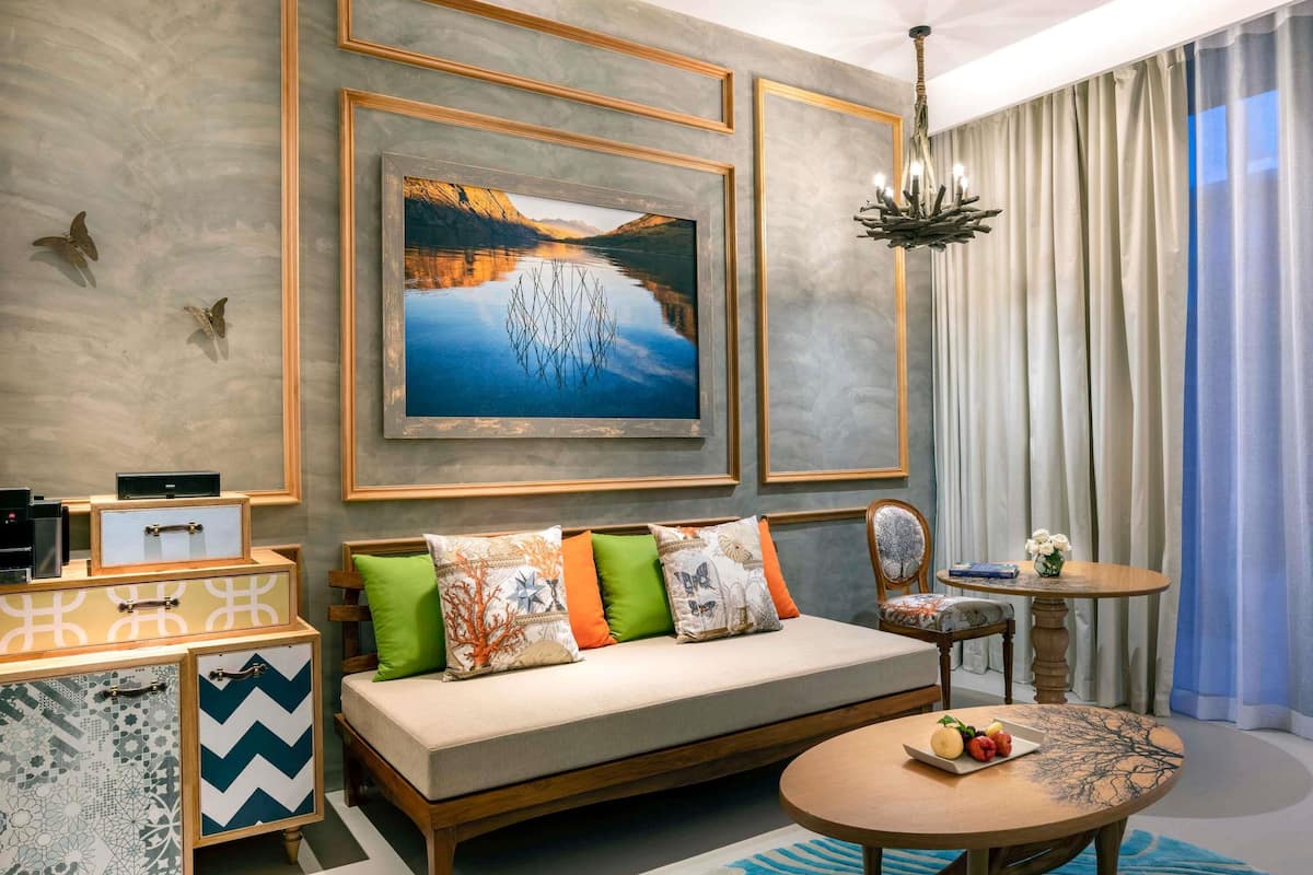 Premium bedding, free minibar items, in-room safe, desk