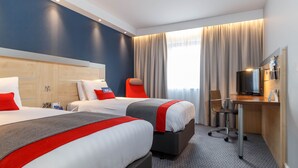 A hotel room with two beds, a desk, a chair, a television, and a large window with curtains. - Holiday Inn Express Walsall M6J10 by IHG (Walsall)