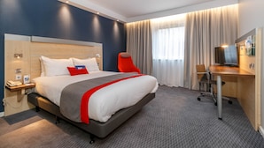A hotel room with a large bed, a desk, a chair, and a TV. - Holiday Inn Express Walsall M6J10 by IHG (Walsall)