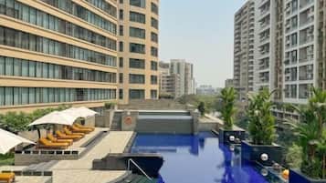 Outdoor pool, pool umbrellas, pool loungers