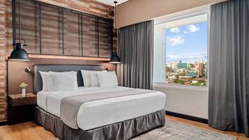 Ropa de cama de alta calidad, camas con pillow-top y minibar