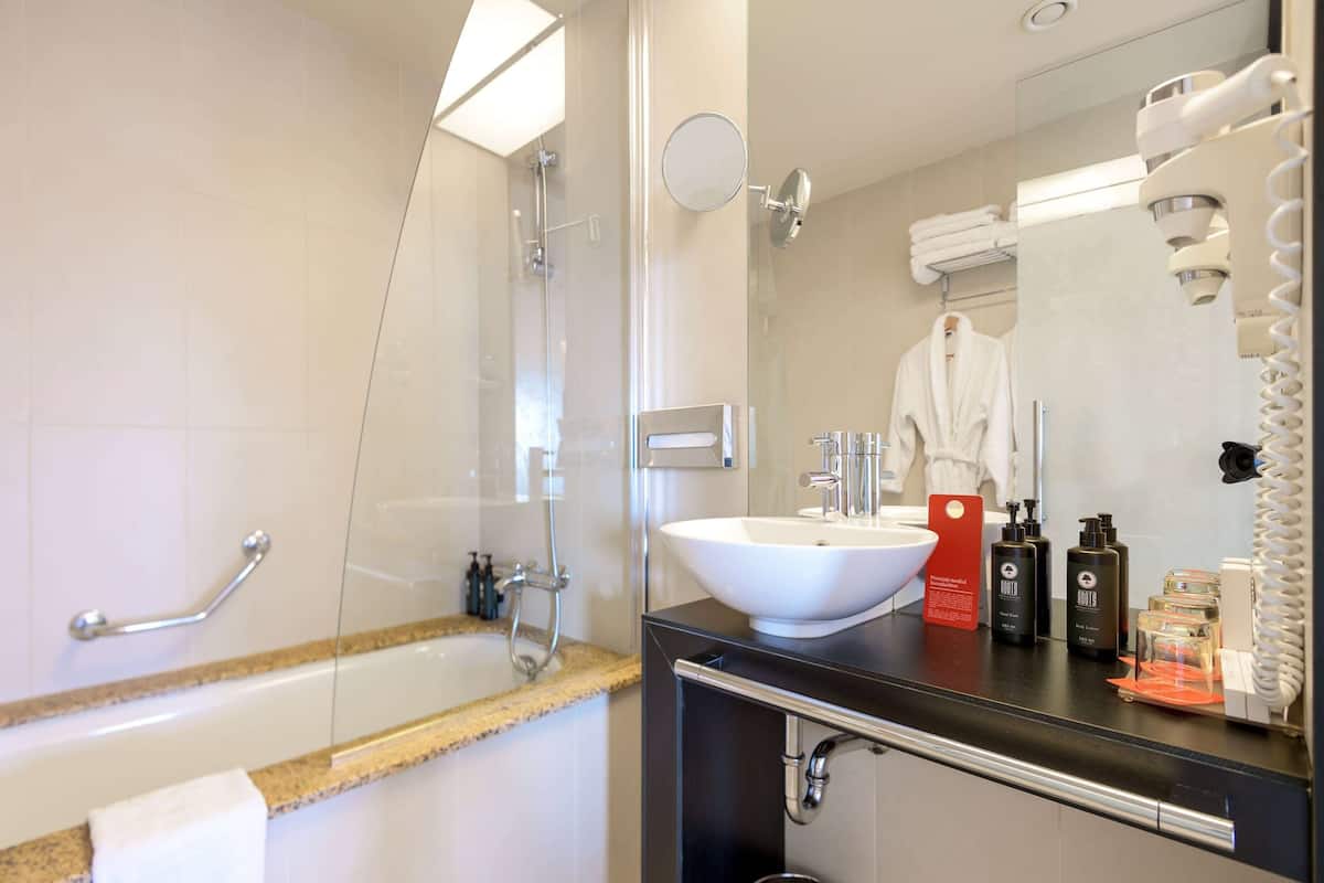 bathtub, free toiletries, hair dryer, bathrobes