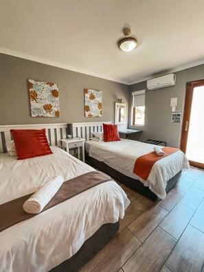 Family Room (with Garden View) | In-room safe, desk, free WiFi, bed sheets