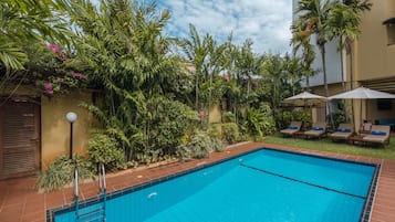 Outdoor pool, pool umbrellas, pool loungers