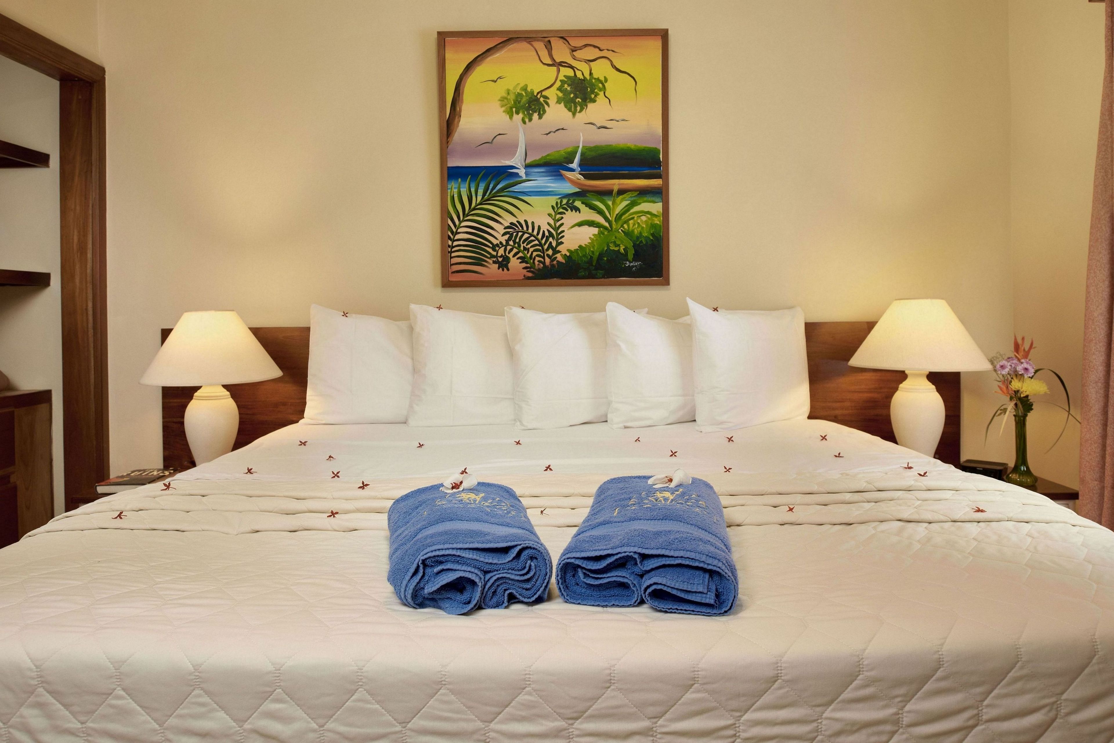 suite, 1 bedroom, partial sea view, poolside | 1 bedroom, pillow-top beds, in-room safe, blackout curtains