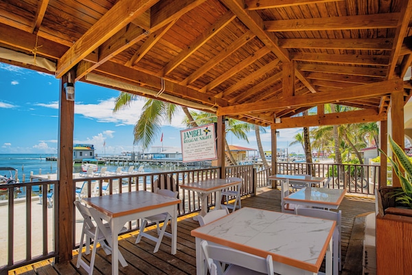 Breakfast, lunch, dinner served; beach views