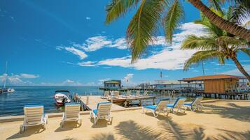 On the beach, white sand, beach towels