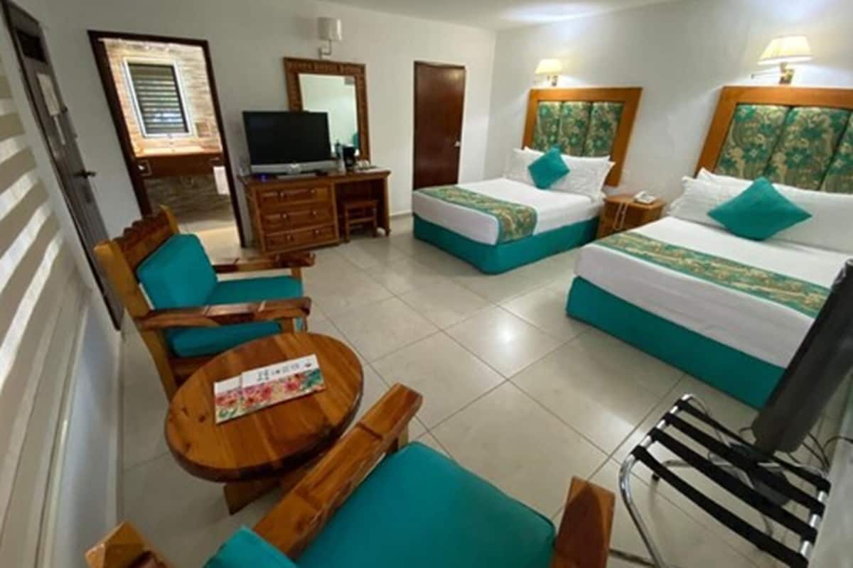 Junior Suite | 1 bedroom, in-room safe, free WiFi, bed sheets