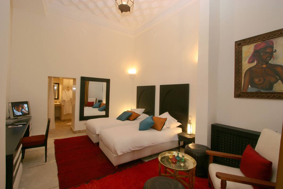 12 bedrooms, premium bedding, in-room safe, individually decorated