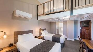 Premium bedding, minibar, desk, laptop workspace