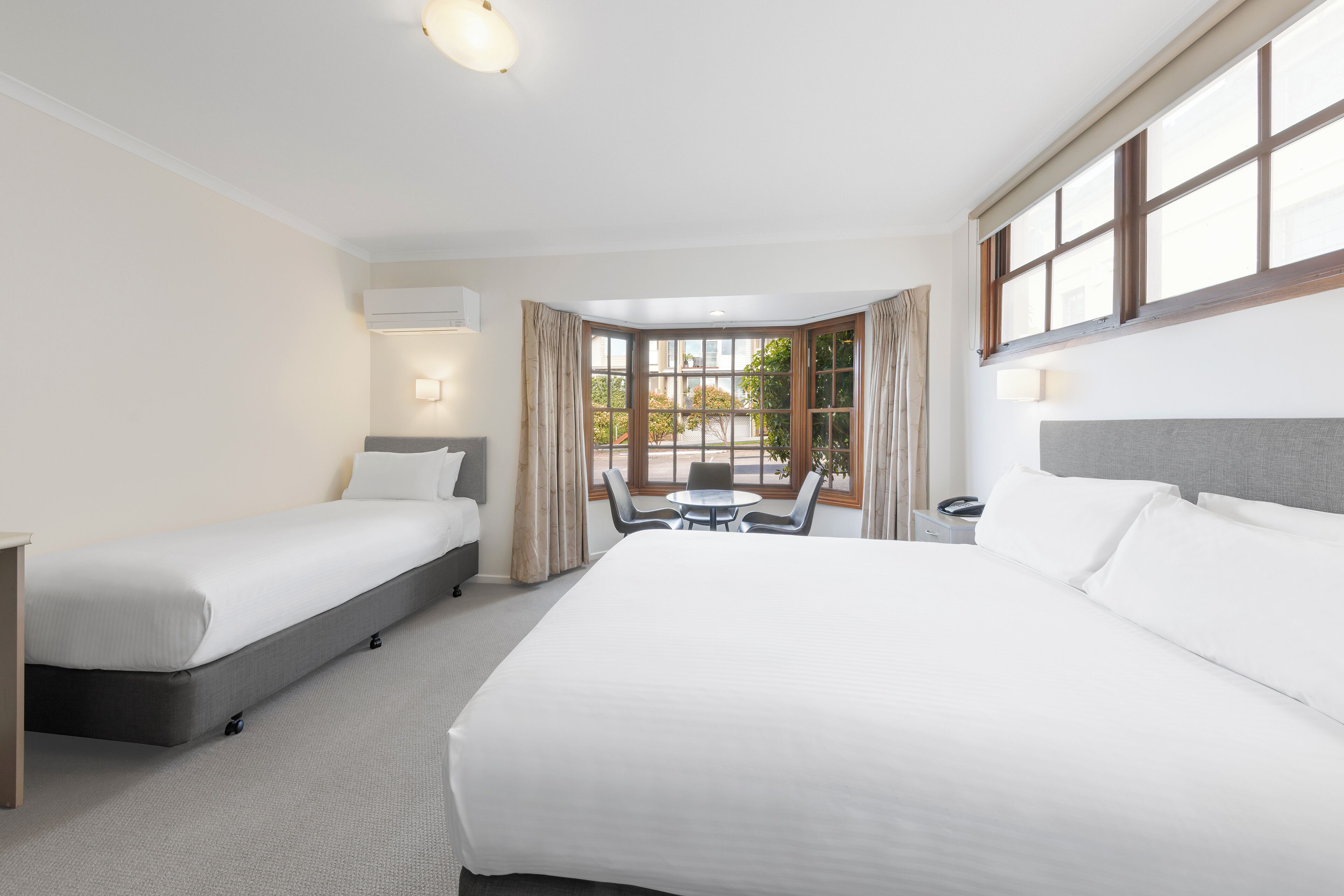 premium twin | 2 bedrooms, premium bedding, minibar, desk