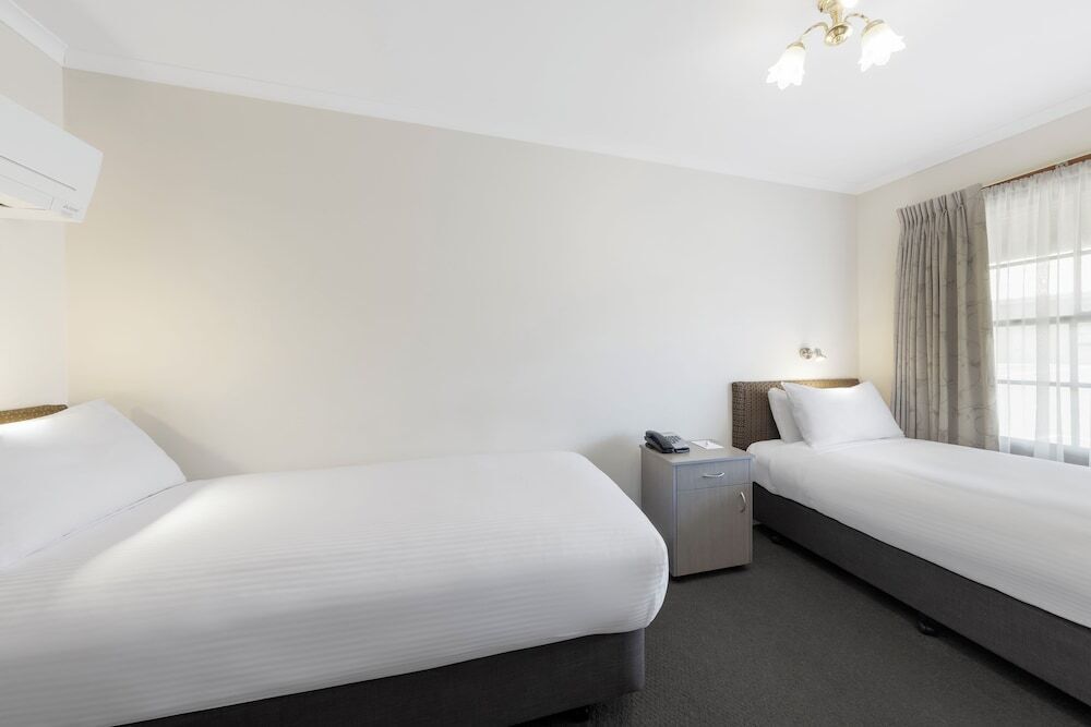 Premium bedding, minibar, desk, laptop workspace