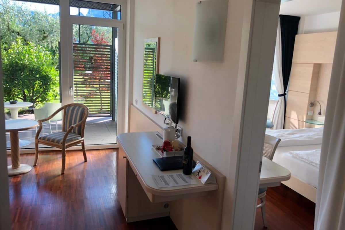 family suite | 1 bedroom, minibar, in-room safe, desk