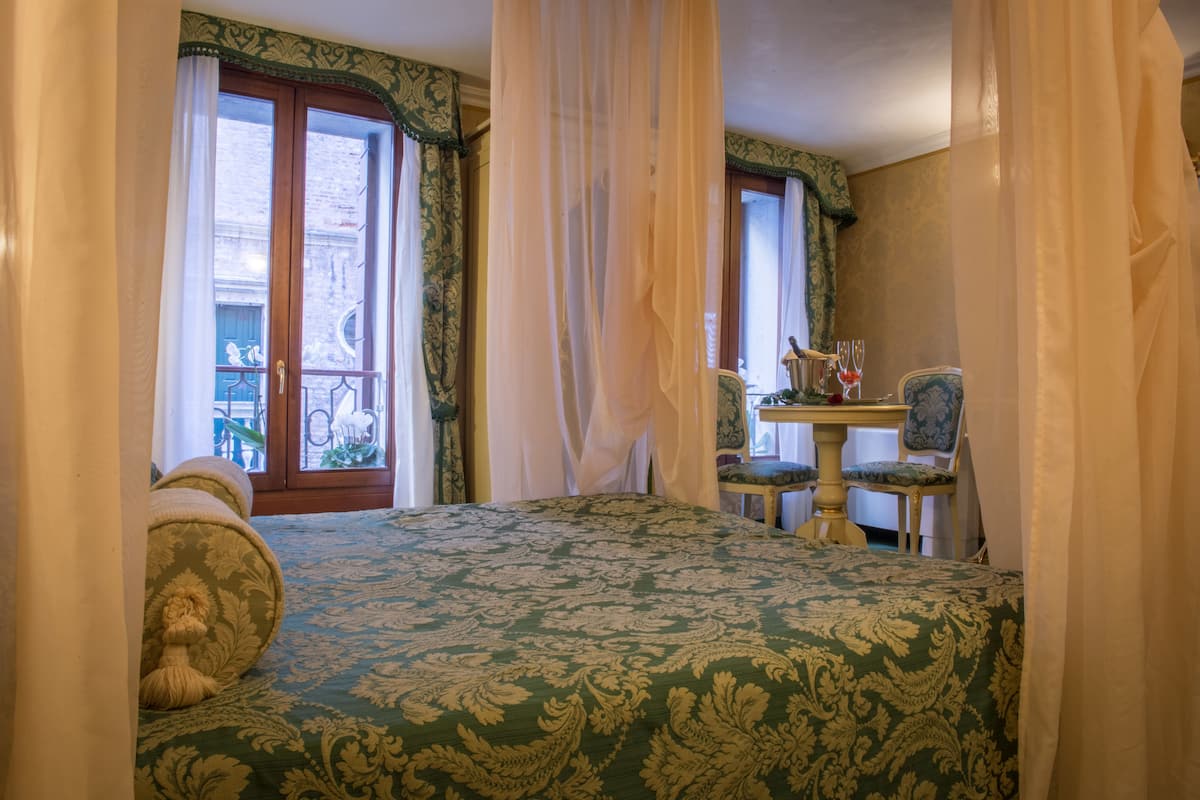 Superior Double Room | Minibar, in-room safe, desk, iron/ironing board