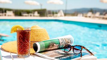 Outdoor pool, pool umbrellas, pool loungers