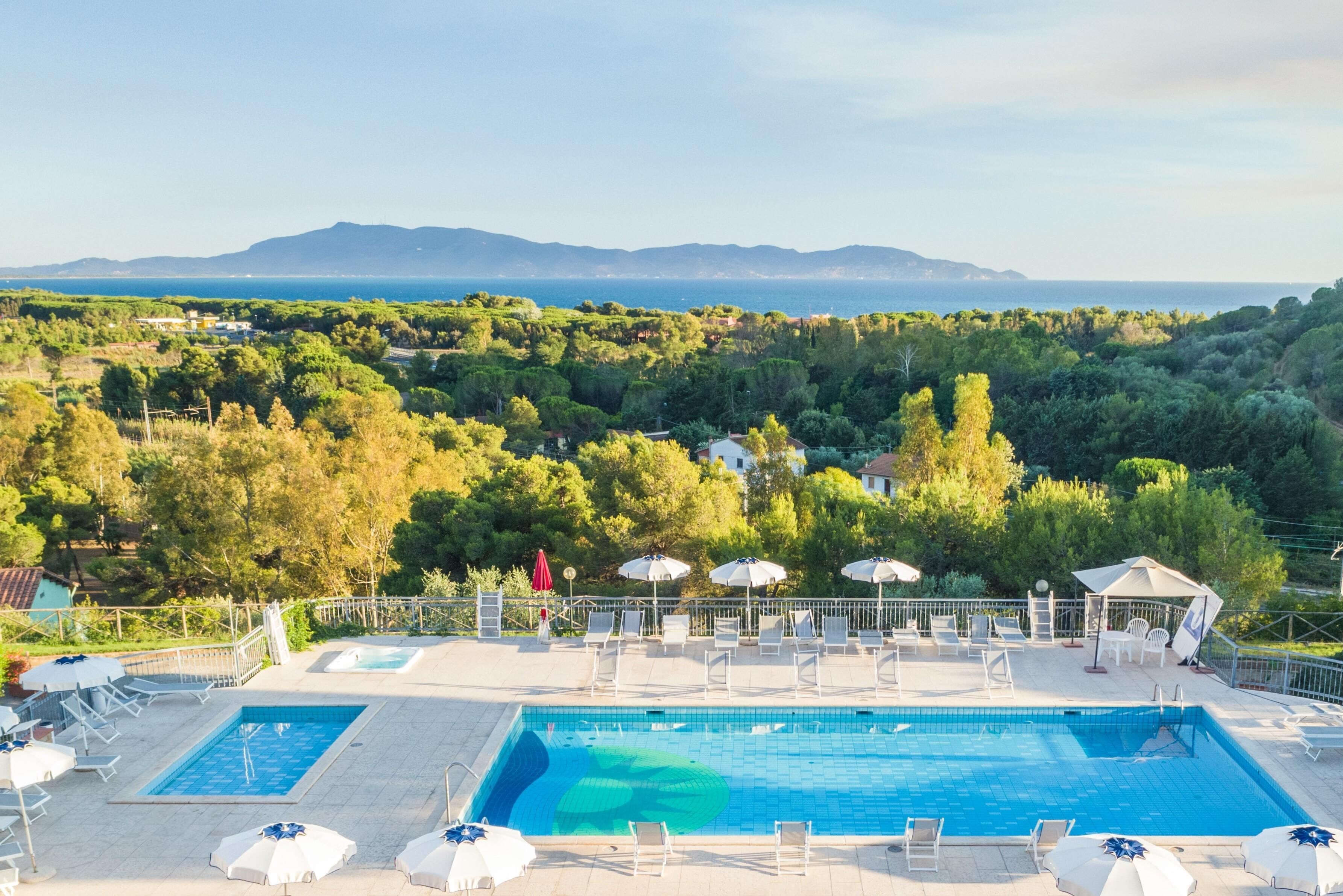 Outdoor pool, pool umbrellas, pool loungers