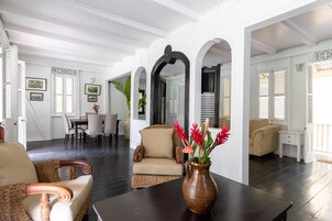 Deluxe Cottage, 2 Bedrooms | Living area | Books