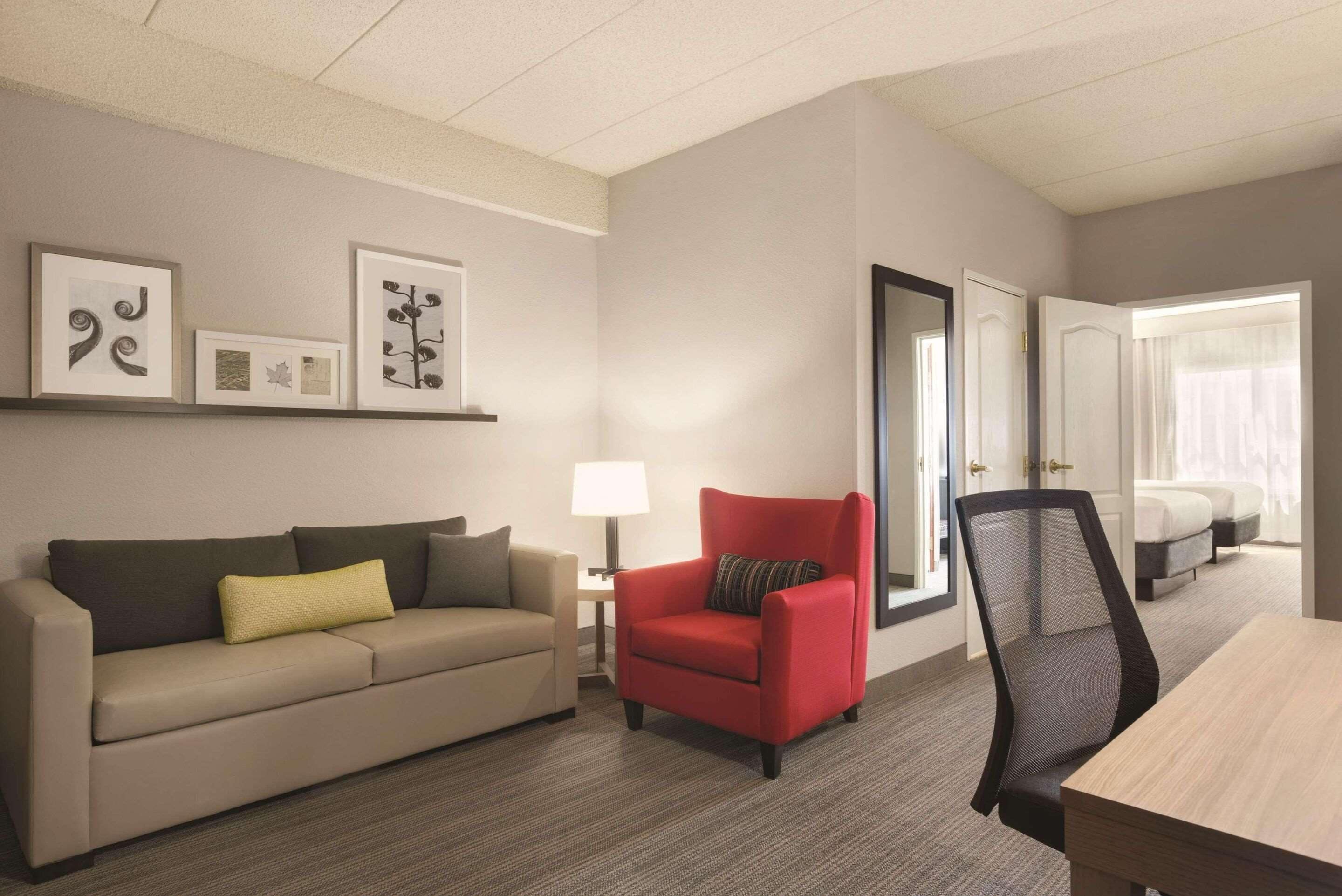 Desk, laptop workspace, blackout drapes, iron/ironing board