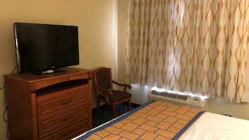 Desk, blackout drapes, iron/ironing board, free cribs/infant beds