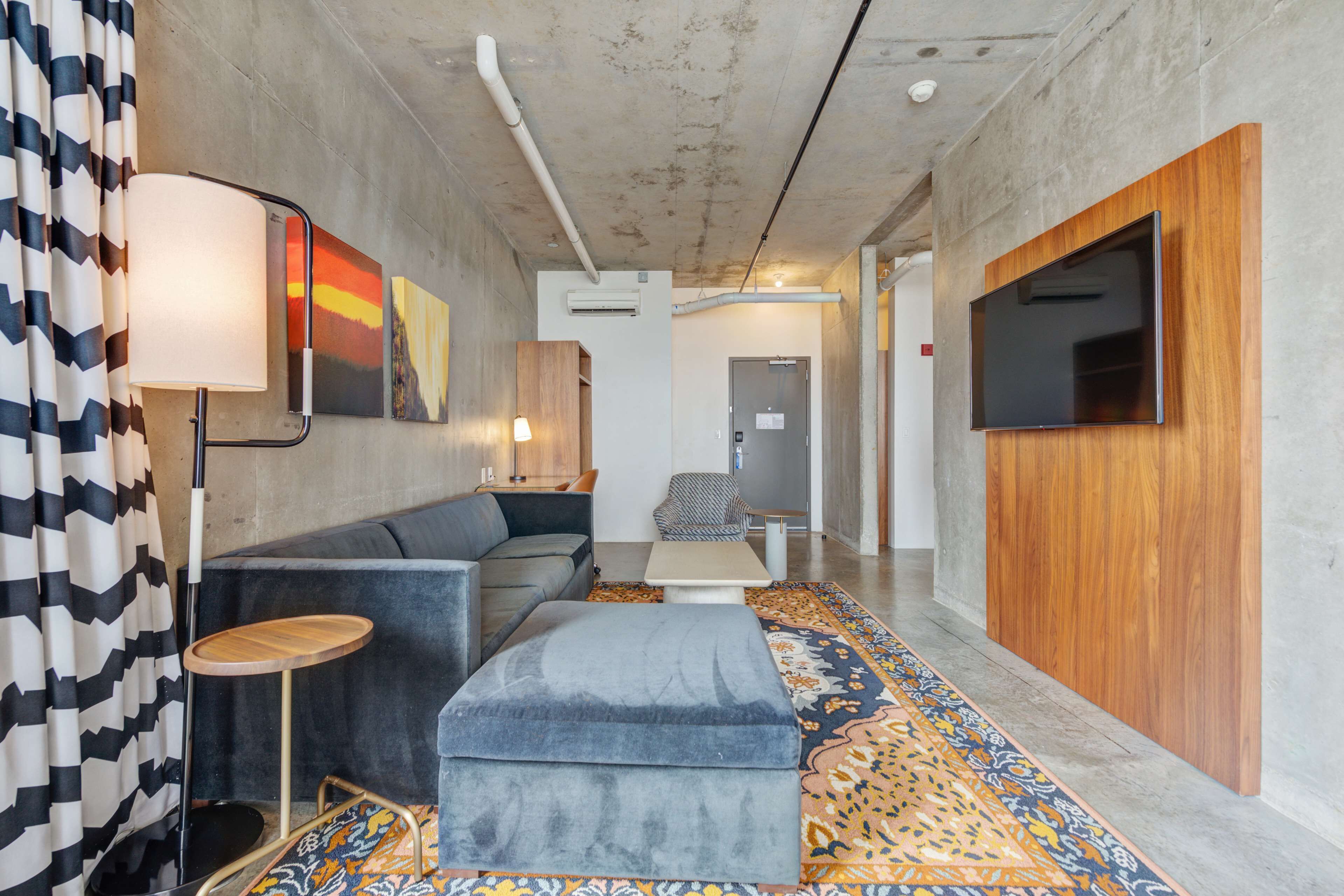 presidential suite, 1 king bed | living area | 50-inch tv with cable channels