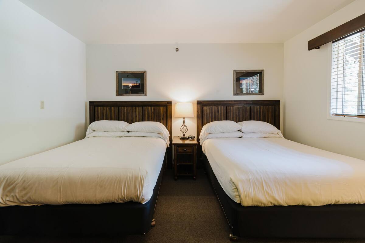 Habitación Deluxe, 2 camas matrimoniales | Wifi gratis y ropa de cama