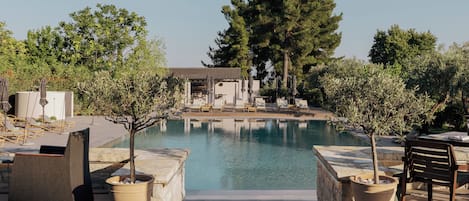 Indoor pool, outdoor pool, open 7:00 AM to 9:00 PM, pool umbrellas